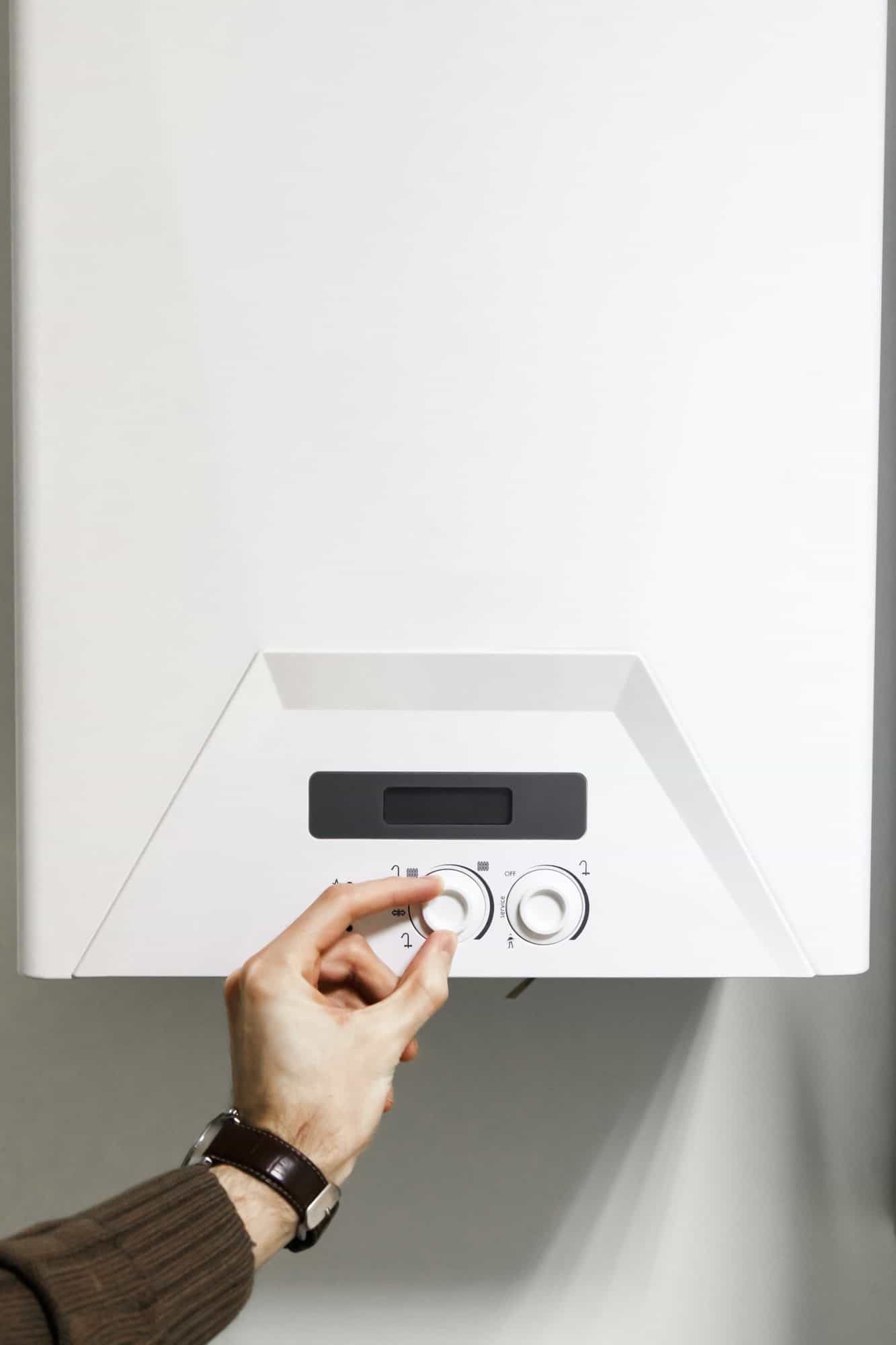 man regulate heating boiler control panel